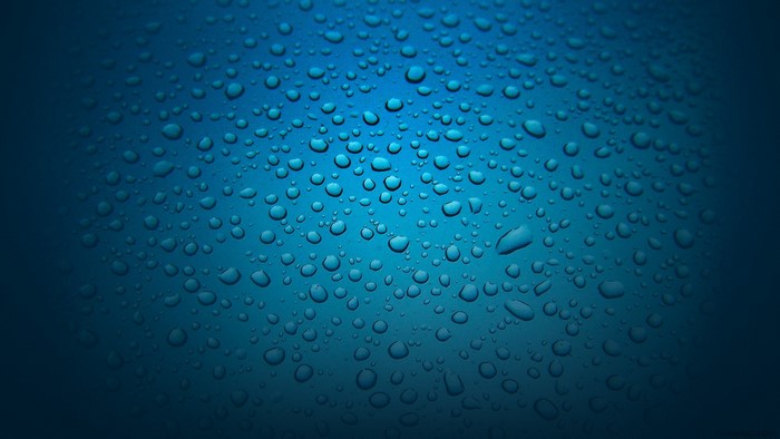 Water drops on blue surface