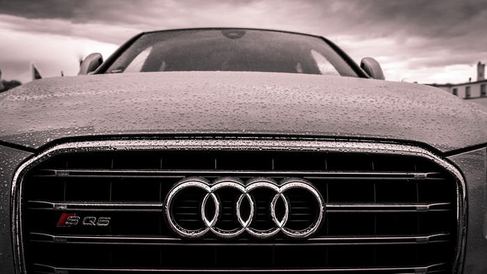 Audi SQ5 car front with water drops