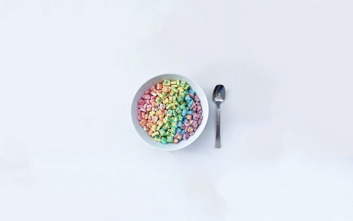 Bowl of rainbow Lucky Charms marshmallows with spoon