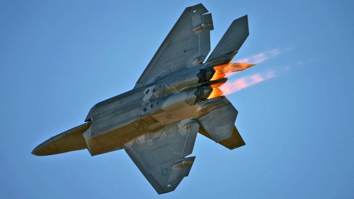 F-22 Raptor jet with afterburners