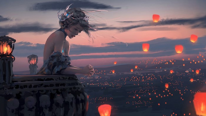 Woman on balcony releasing sky lanterns at dusk