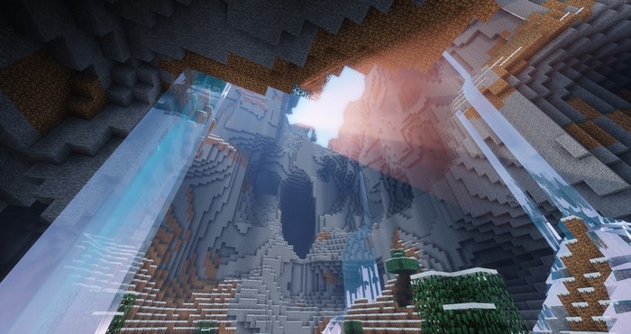 Minecraft cave with waterfalls and sunbeams