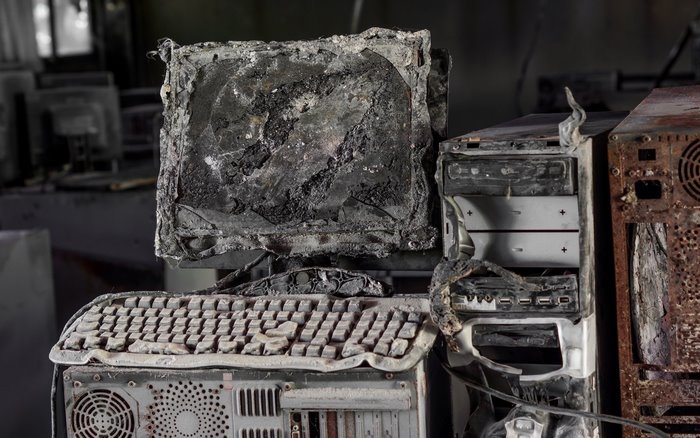Burnt computer monitor, keyboard, and tower