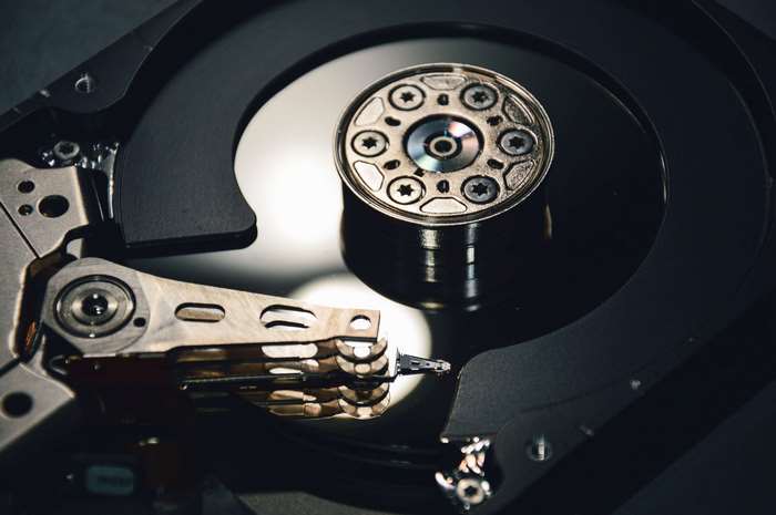 Closeup of an open hard disk drive (HDD) technology