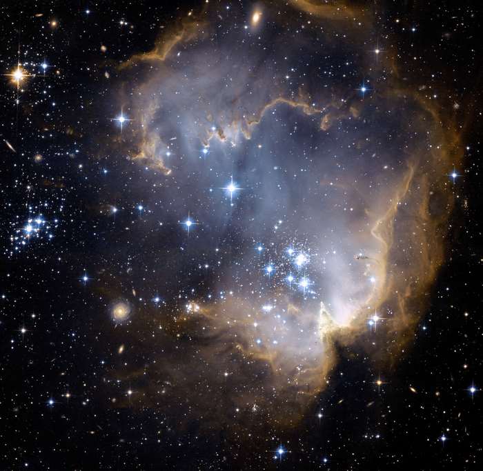 Star cluster within a nebula in space