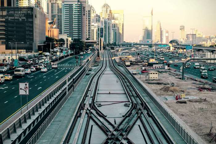 Dubai highway and metro tracks with skyscrapers