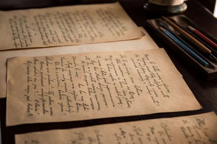 Old handwritten letters and writing tools