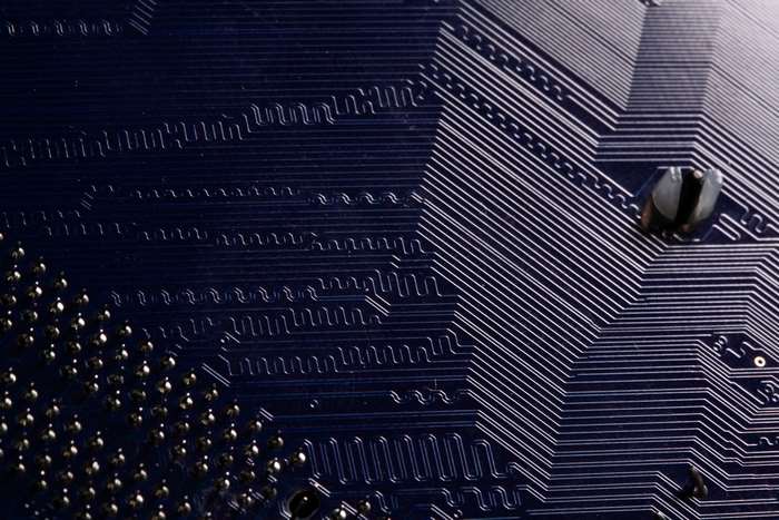 Close-up of a computer circuit board with intricate patterns