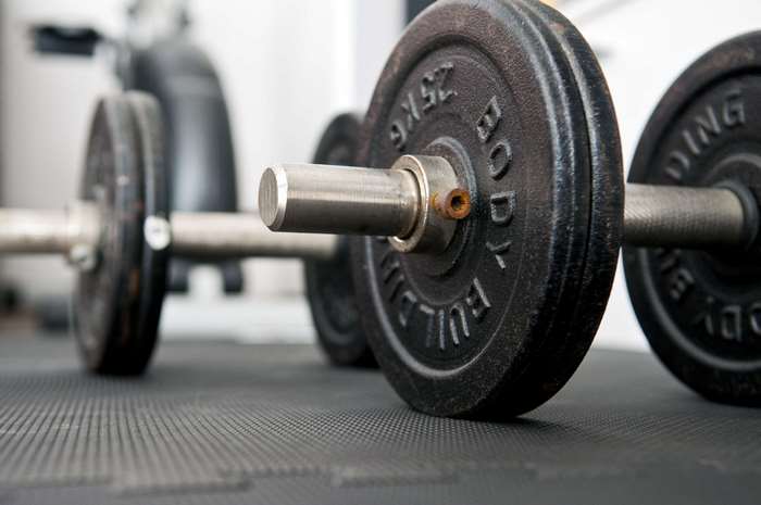 Dumbbells with 25kg plates in a gym 4K