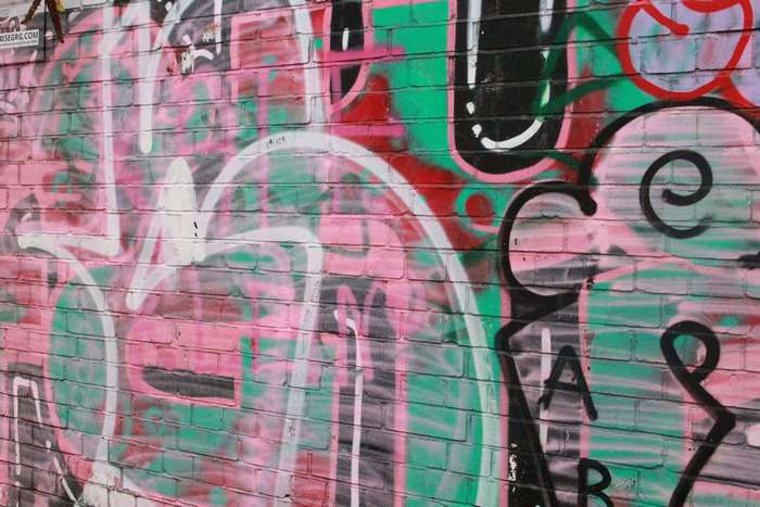 Graffiti on a brick wall in Shoreditch, London
