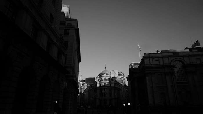 Black and white street view of old London buildings
