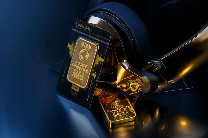 Gold bars and luxury headphones