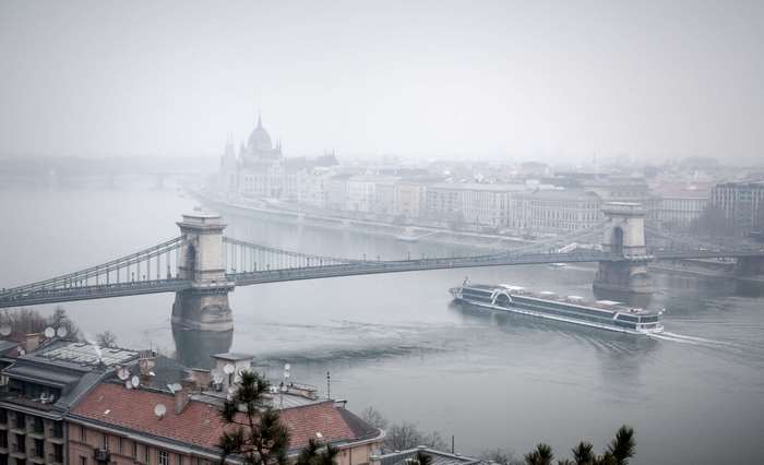 Budapest cityscape with Chain Bridge and Parliament Building in fog
