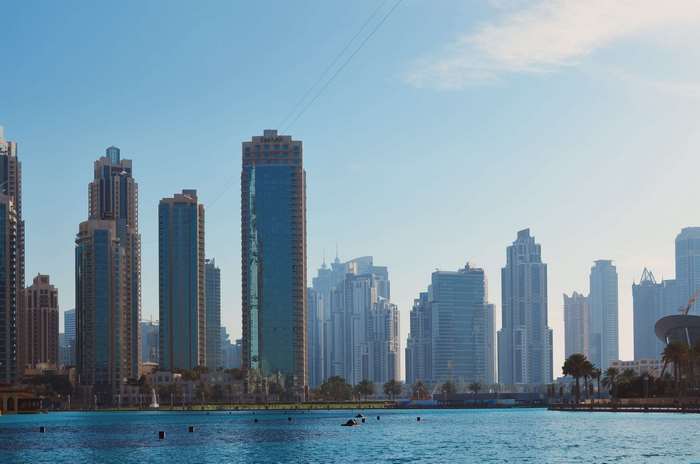 Dubai skyline with skyscrapers and a body of water