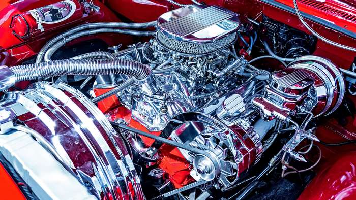 Close-up of a shiny chrome engine compartment of a US car