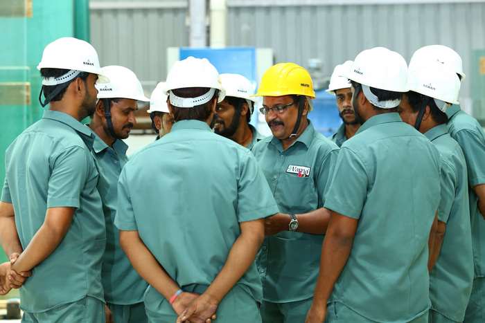 Group of construction workers in hard hats