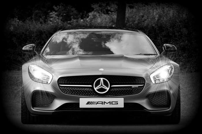 Mercedes-Benz AMG GT car with headlights on