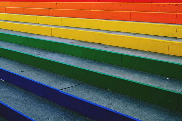 Rainbow colored steps in an urban setting