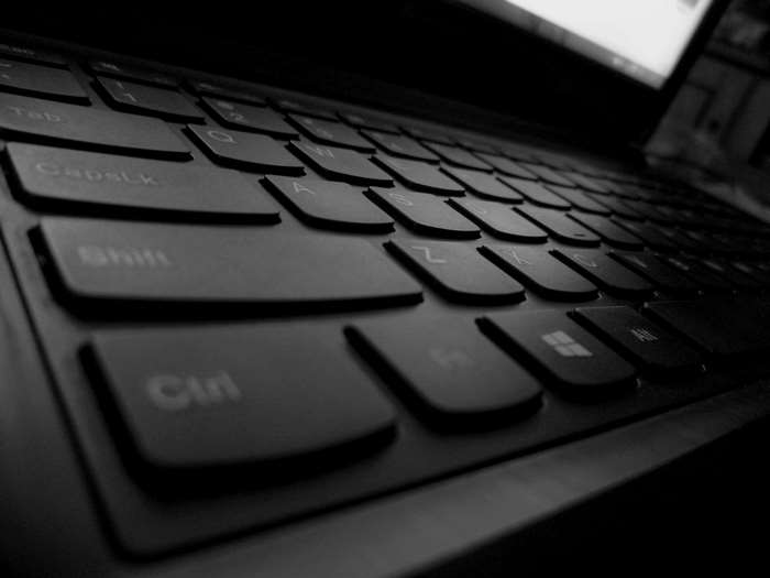 Close-up of a black laptop keyboard with 'Ctrl' and 'Shift' keys visible