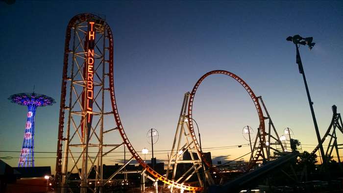 Thunderbolt roller coaster at Coney Island at sunset