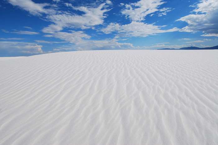 White Sands National Monument landscape with gypsum dunes and sky