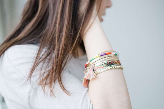 Woman wearing colorful bracelets