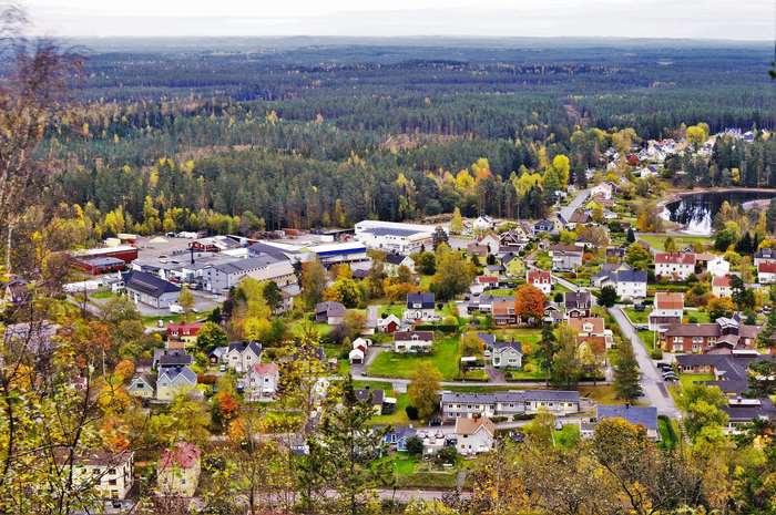 Small town in Sweden with forest and lake