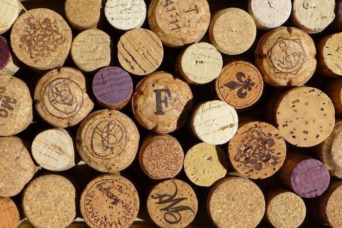 Close-up of wine corks with various stamps