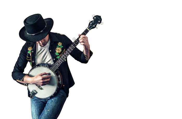 Man in cowboy hat playing banjo
