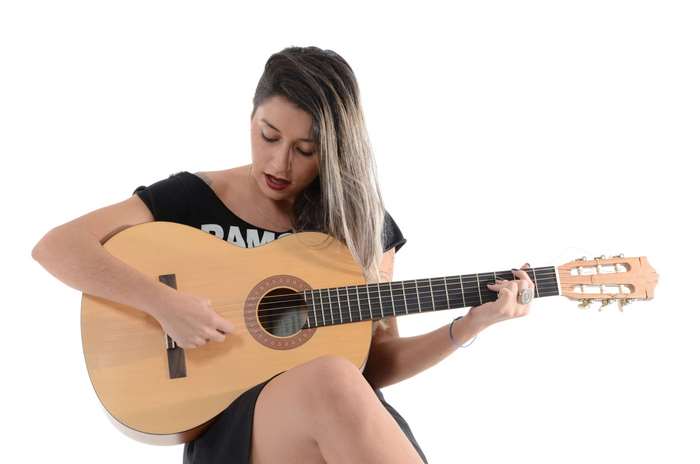 Woman playing guitar