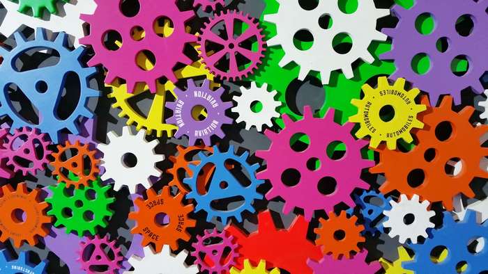 Colorful gears in a mechanical arrangement