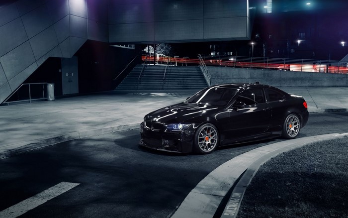 Black BMW 335i Coupe parked at night