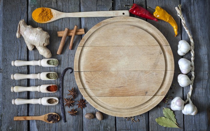 Spices and ingredients on a wooden table