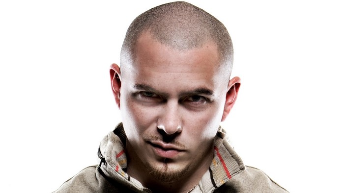 Pitbull, bald man with goatee