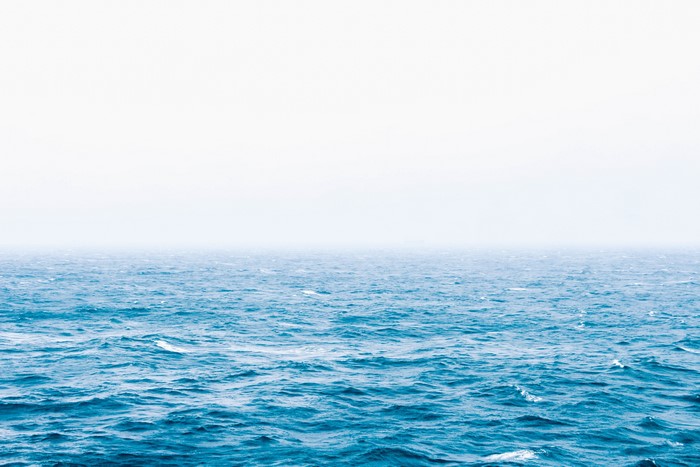Ocean surface with waves and fog