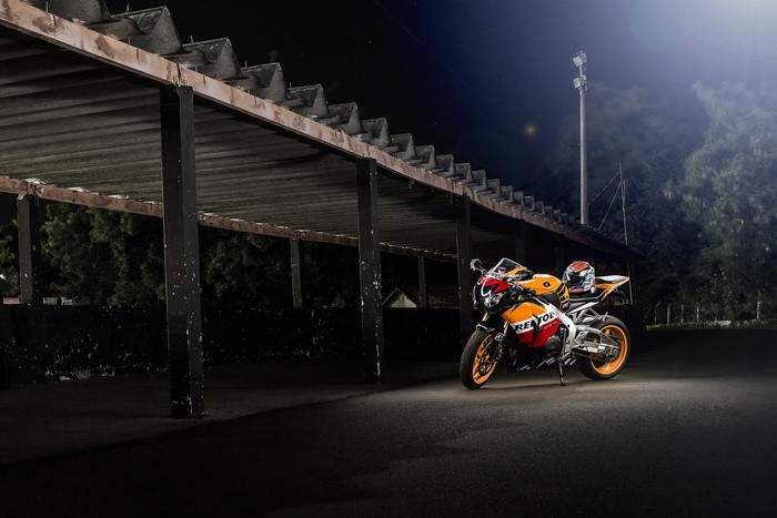 Honda CBR1000RR Repsol motorcycle parked at night
