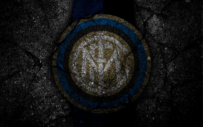 Inter Milan logo on a cracked dark background