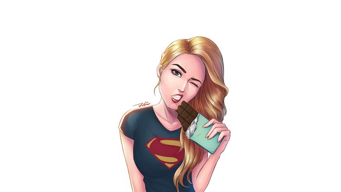 Blonde woman in Supergirl shirt eating chocolate