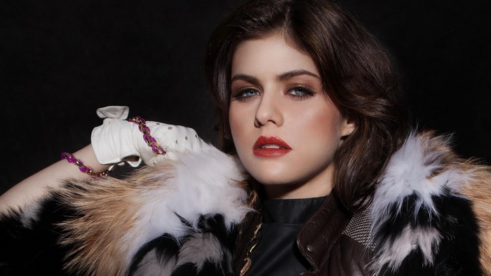 Alexandra Daddario wearing a fur coat and gloves