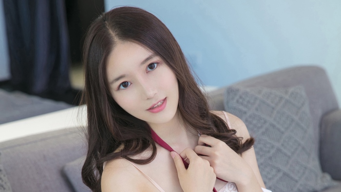 Asian woman with long brown hair