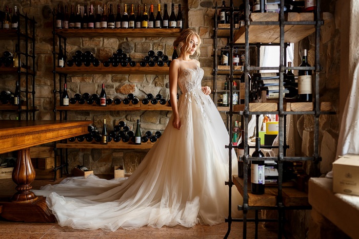 Elegant Bride in Flowing White Wedding Dress
