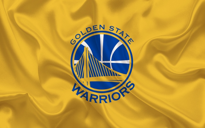 Golden State Warriors logo on a yellow satin background