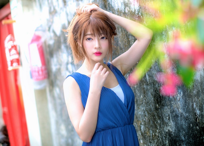 Portrait of Woman in Blue Dress with Soft Light