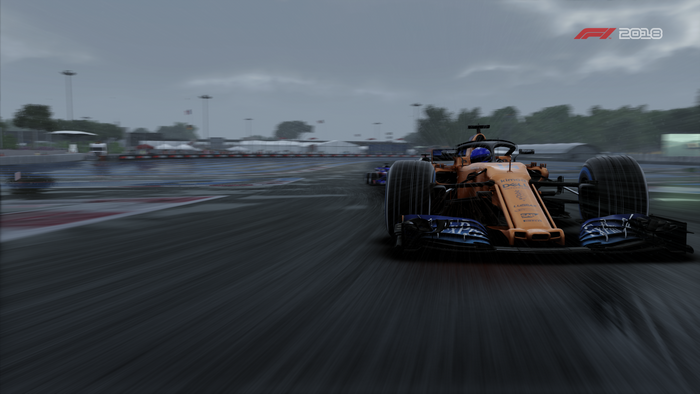 McLaren MCL33 Formula 1 car racing in the rain
