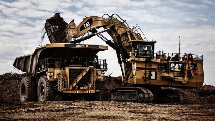 Caterpillar 789D Excavator Loading Dump Truck