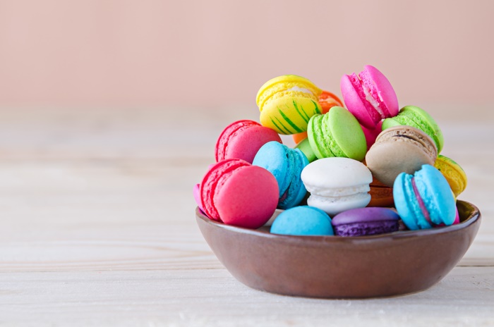 Colorful Macarons in a Brown Bowl