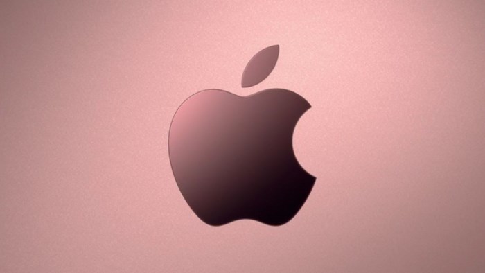 Apple logo on a rose gold background