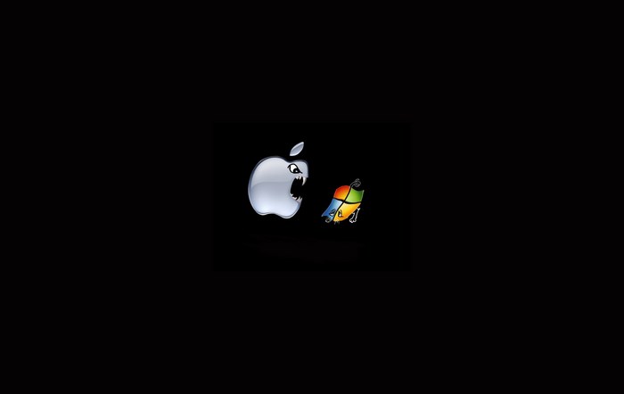 Apple logo attacking Windows logo
