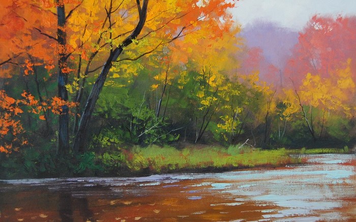 Autumn trees by a river