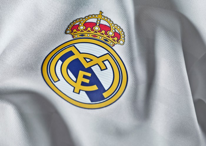 Real Madrid crest on white fabric